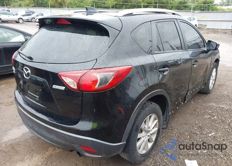2014 Mazda Cx-5 Touring z USA, uszkodzony, nr VIN JM3KE4CY6E0367017